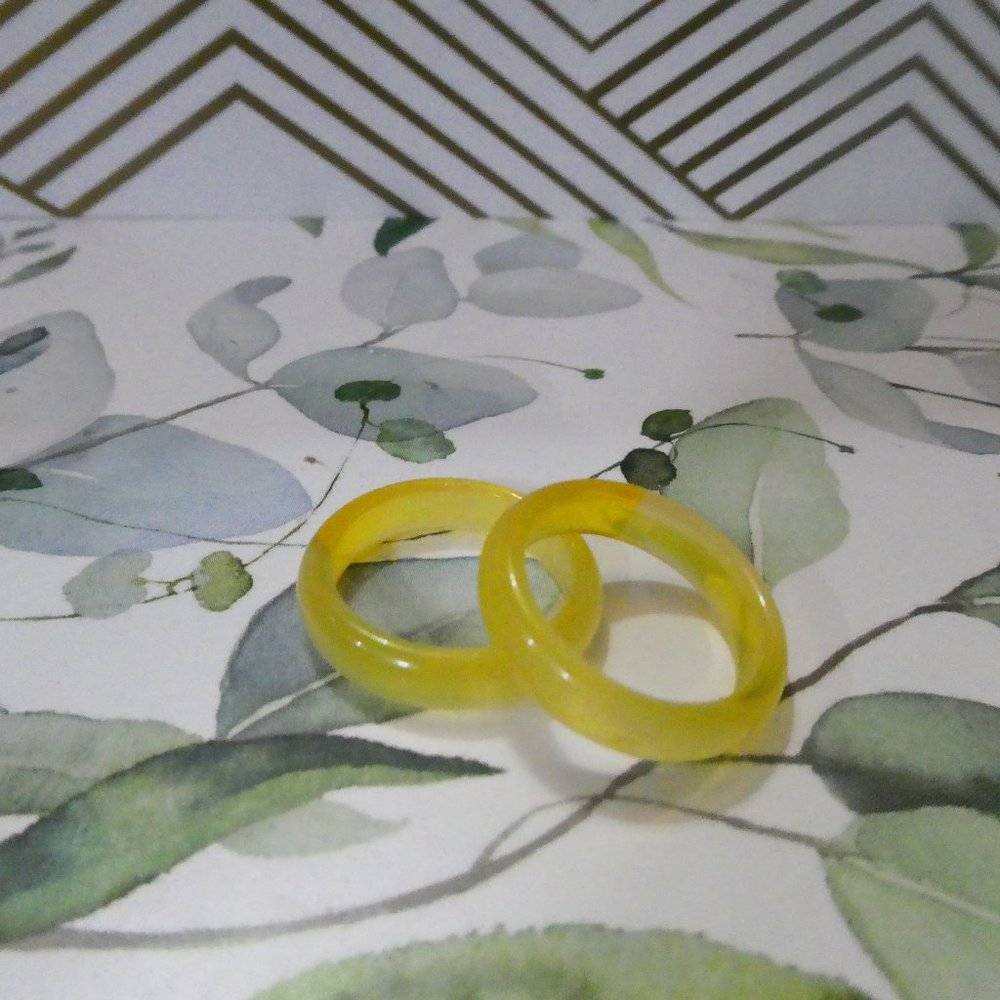 Set of two yellow translucent plastic rings modern